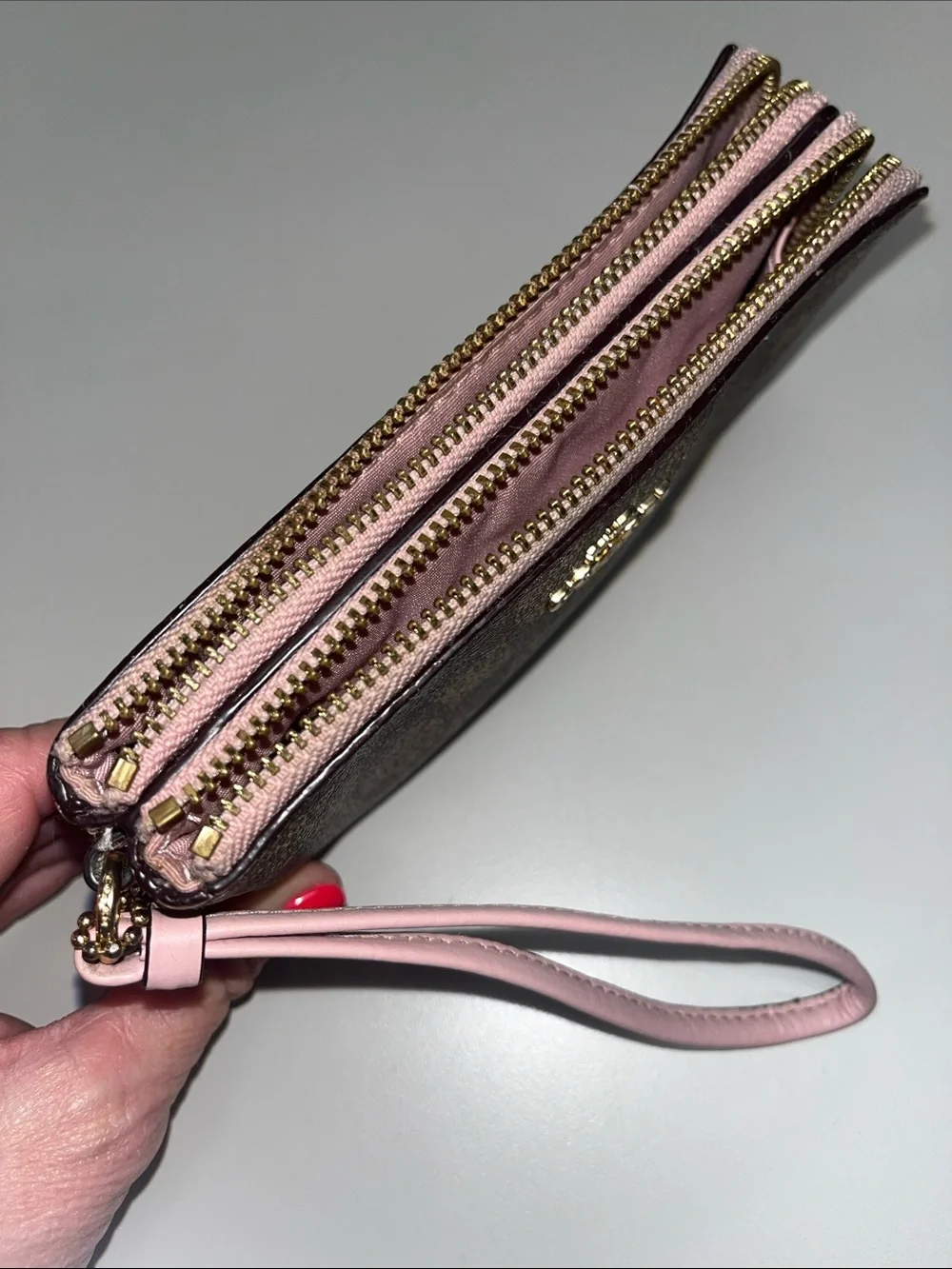Coach Brown Signature Canvas Wristlet with Pink Trim
